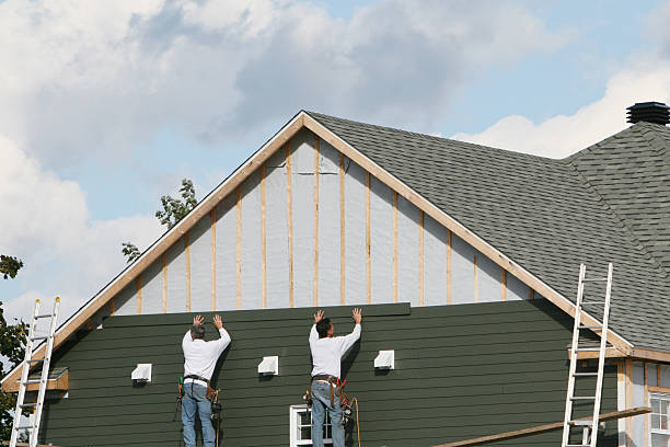 Professional Siding Replacement technician working in Brinklow, MD
